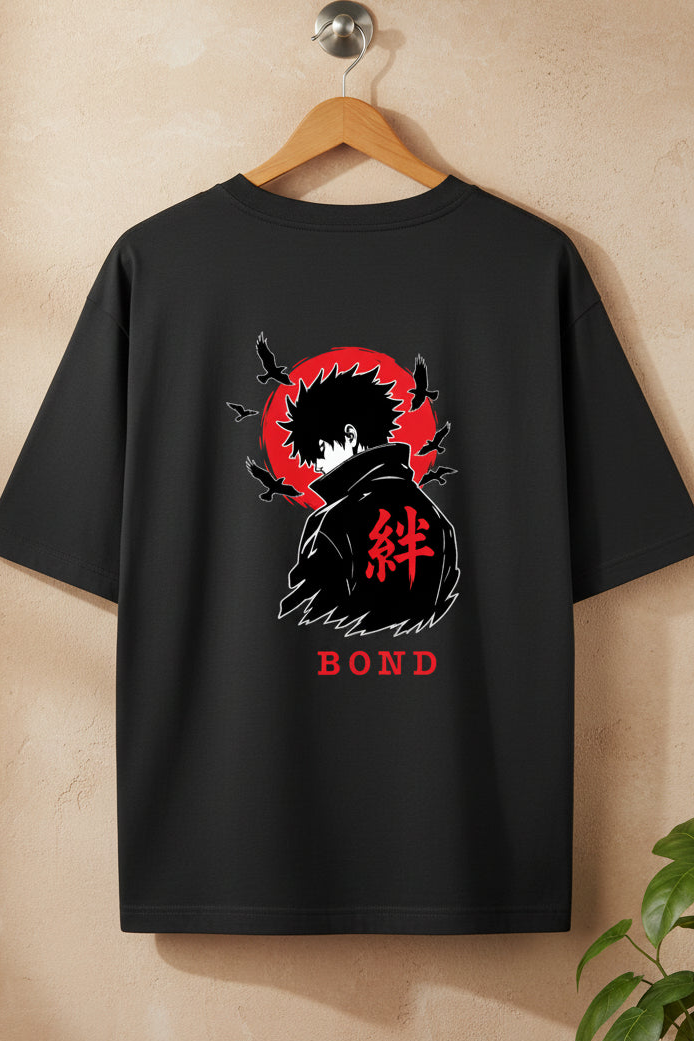A black short-sleeve t-shirt hanging on a wooden hanger against a textured beige wall. The back of the shirt features a graphic print of the anime character Jogo Bond with a red sun, black birds, and the red Japanese kanji character for 'tie' (絆) above the name 'BOND' in red.